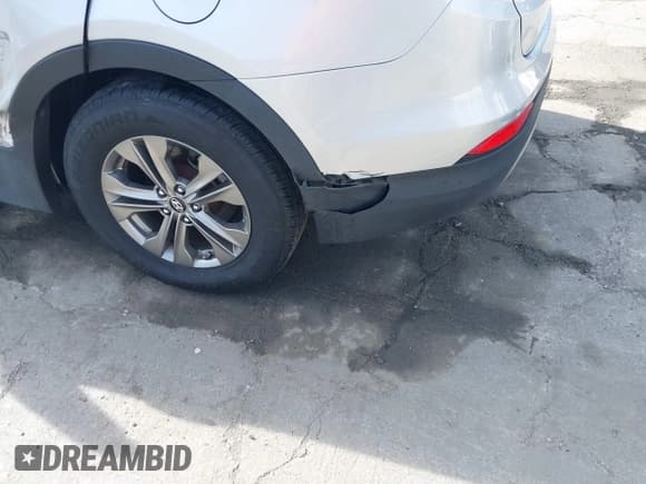 ✅ 2014 Hyundai Santa Fe • VIN: 5XYZU3LB7EG205102 • Lot: 43657537. Wystawiony na IAAI z przebiegiem 142 689 mil. Bezpłatny archiwum sprzedaży aukcyjnych z USA i szczegółowy raport historii pojazdu na DreamBid. Zdjęcie 14.