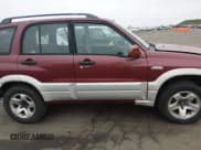 ✅ 2000 Suzuki Grand Vitara JLX • VIN: JS3TD62V9Y4112122 • Lot: 43838714. Listed on IAAI with Not provided. Free auction sales archive from the USA and detailed vehicle history report at DreamBid. Image 13.