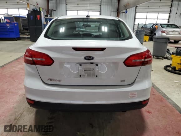 ✅ 2018 Ford Focus SE • VIN: 1FADP3F26JL267575 • Lot: 91492855. Listed on Copart with 79,415 mi. Free auction sales archive from the USA and detailed vehicle history report at DreamBid. Image 6.