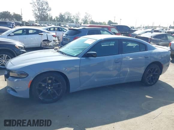 2021 Dodge Charger SXT with VIN 2C3CDXBG7MH507567, listed as a IAAI auction lot 43343265 with 53,576 mi miles and . Bid and sale history available at DreamBid. Image 14.