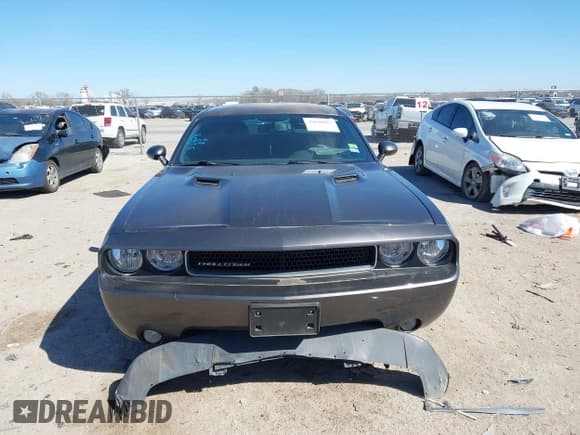 ✅ 2014 Dodge Challenger SXT • VIN: 2C3CDYAG7EH273956 • Lot: 41830767. Listed on IAAI with 142,181 mi. Free auction sales archive from the USA and detailed vehicle history report at DreamBid. Image 12.