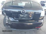 ✅ 2012 Mazda CX-7 i Touring • VIN: JM3ER2CMXC0421774 • Lot: 41743231. Wystawiony na IAAI z przebiegiem 132 488 mil. Bezpłatny archiwum sprzedaży aukcyjnych z USA i szczegółowy raport historii pojazdu na DreamBid. Zdjęcie 6.