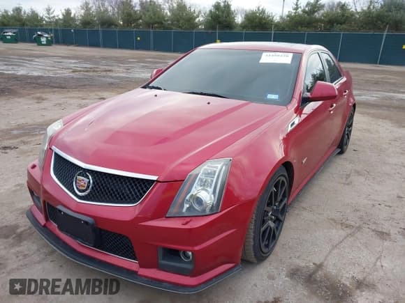 ✅ 2011 Cadillac CTS-V • VIN: 1G6DV5EP1B0130333 • Lot: 41488420. Listed on IAAI with 79,244 mi. Free auction sales archive from the USA and detailed vehicle history report at DreamBid. Image 2.