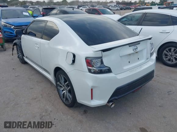 ✅ 2015 Scion tC • VIN: JTKJF5C78FJ001840 • Lot: 43529497. Wystawiony na IAAI z przebiegiem 128 216 mil. Bezpłatny archiwum sprzedaży aukcyjnych z USA i szczegółowy raport historii pojazdu na DreamBid. Zdjęcie 3.