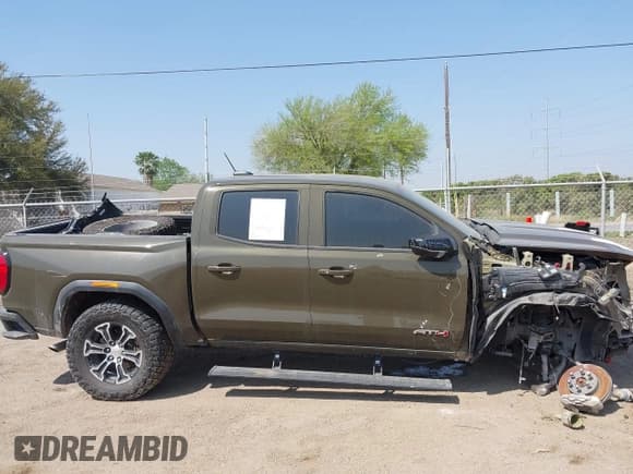 ✅ 2023 GMC Canyon 4WD AT4 • VIN: 1GTP6DEK5P1231432 • Lot: 41785102. Listed on IAAI with 33,154 mi. Free auction sales archive from the USA and detailed vehicle history report at DreamBid. Image 14.