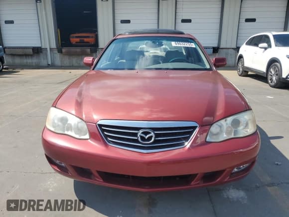 ✅ 2002 Mazda Millenia S • VIN: JM1TA222021728032 • Lot: 69032255. Listed on Copart with 42,936 mi. Free auction sales archive from the USA and detailed vehicle history report at DreamBid. Image 5.