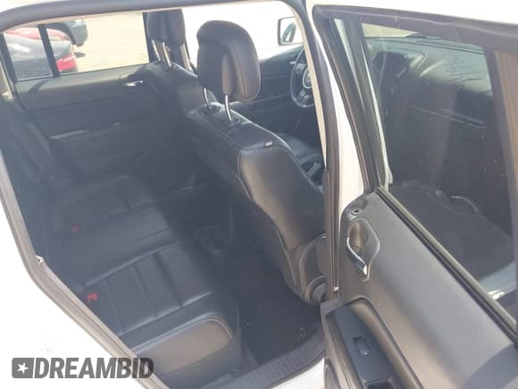 ✅ 2014 Jeep Patriot Latitude • VIN: 1C4NJPFA3ED682027 • Lot: 42794960. Listed on IAAI with 108,247 mi. Free auction sales archive from the USA and detailed vehicle history report at DreamBid. Image 8.