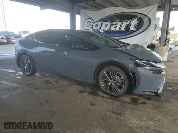 2024 Toyota Prius XLE with VIN JTDADABU2R3017795, listed as a Copart auction lot 85060145 with 5,263 mi miles and Salvage title. Bid and sale history available at DreamBid. Image 4.