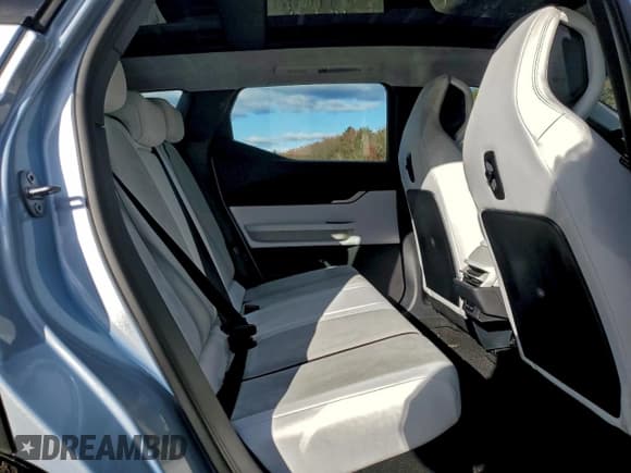 ✅ 2023 Fisker Ocean One • VIN: VCF1ZBU21PG004710 • Lot: 93504935. Listed on Copart with 12,437 mi. Free auction sales archive from the USA and detailed vehicle history report at DreamBid. Image 11.