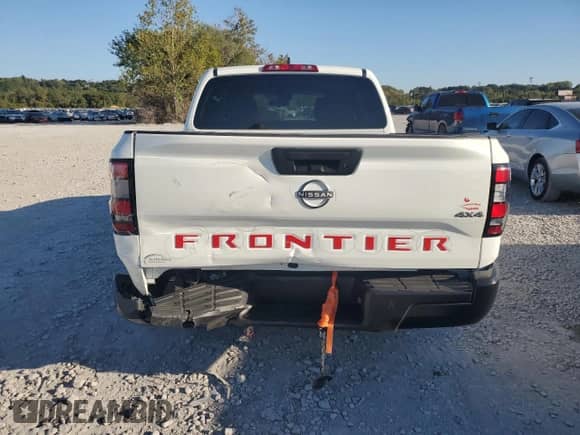 2023 Nissan Frontier SV with VIN 1N6ED1EKXPN633870, listed as a Copart auction lot 82396855 with 23,931 mi miles and Salvage title. Bid and sale history available at DreamBid. Image 6.