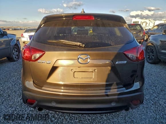 ✅ 2016 Mazda CX-5 Grand Touring • VIN: JM3KE2DY4G0906899 • Lot: 93922385. Wystawiony na Copart z przebiegiem 81 571 mil. Bezpłatny archiwum sprzedaży aukcyjnych z USA i szczegółowy raport historii pojazdu na DreamBid. Zdjęcie 6.
