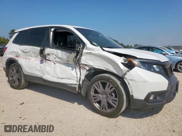 ✅ 2021 Honda Passport EX-L • VIN: 5FNYF7H55MB004689 • Lot: 80755855. Listed on Copart with 97,016 mi. Free auction sales archive from the USA and detailed vehicle history report at DreamBid. Image 4.