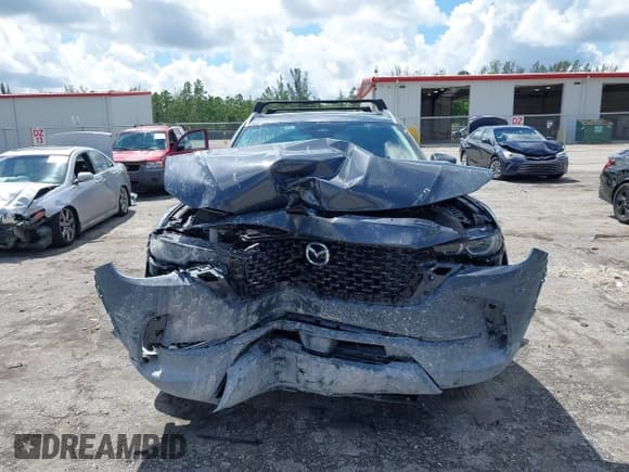 ✅ 2025 Mazda CX-50 Hybrid Premium Plus Package • VIN: 7MMVAAEW9SN127423 • Lot: 43322908. Wystawiony na IAAI z przebiegiem 2 928 mil. Bezpłatny archiwum sprzedaży aukcyjnych z USA i szczegółowy raport historii pojazdu na DreamBid. Zdjęcie 6.