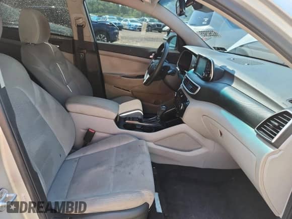 2019 Hyundai Tucson Value with VIN KM8J3CA47KU014032, listed as a Copart auction lot 63592985 with 62,040 mi miles and Salvage title. Bid and sale history available at DreamBid. Image 7.