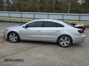 ✅ 2015 Volkswagen CC R-Line • VIN: WVWBN7AN5FE817893 • Lot: 89400875. Listed on Copart with 154,105 mi. Free auction sales archive from the USA and detailed vehicle history report at DreamBid. Image 2.