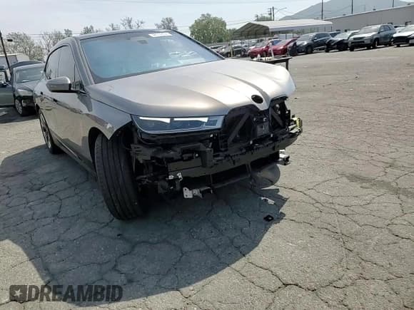 ✅ 2023 BMW iX xDrive50 • VIN: WB523CF08PCL23306 • Лот: 48559294. Опубликован ранее на Copart с пробегом 13 823 миль. Бесплатный доступ к архиву аукционных продаж из США и подробный отчёт об истории автомобиля на DreamBid. Изображение 11.