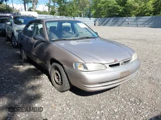 ✅ 1999 Toyota Corolla VE • VIN: 2T1BR12E1XC141396 • Лот: 42969365. Опубликован ранее на IAAI с пробегом 215 831 миль. Бесплатный доступ к архиву аукционных продаж из США и подробный отчёт об истории автомобиля на DreamBid. Изображение 1.