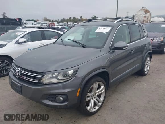 ✅ 2013 Volkswagen Tiguan S • VIN: WVGBV3AX3DW577045 • Lot: 43811665. Listed on IAAI with 161,847 mi. Free auction sales archive from the USA and detailed vehicle history report at DreamBid. Image 2.