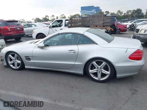 ✅ 2005 Mercedes-Benz SL 500 • VIN: WDBSK75FX5F089216 • Лот: 43628851. Опубликован ранее на IAAI с пробегом 131 800 миль. Бесплатный доступ к архиву аукционных продаж из США и подробный отчёт об истории автомобиля на DreamBid. Изображение 14.