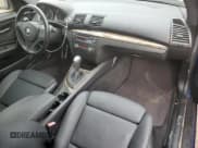 ✅ 2010 BMW 1 Series 128i • VIN: WBAUP7C58AVK77297 • Lot: 68313215. Listed on Copart with 103,274 mi. Free auction sales archive from the USA and detailed vehicle history report at DreamBid. Image 8.