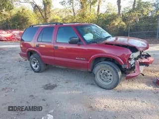✅ 2003 Chevrolet Blazer LS • VIN: 1GNCS13X73K103616 • Lot: 43478103. Wystawiony na IAAI z przebiegiem 274 996 mil. Bezpłatny archiwum sprzedaży aukcyjnych z USA i szczegółowy raport historii pojazdu na DreamBid. Zdjęcie 1.