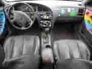 2002 Hyundai Elantra GT z VIN KMHDN55D82U052141, wystawiony jako Copart lot #79711964 z przebiegiem 192 328 mil mil oraz Szkoda całkowita • Salvage title. Historia ofert i sprzedaży dostępna na DreamBid. Obrazek 8.