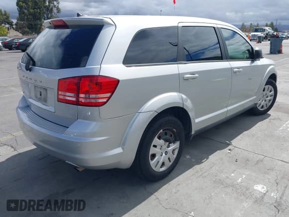 ✅ 2014 Dodge Journey SE • VIN: 3C4PDCAB8ET173778 • Lot: 43189104. Listed on IAAI with 160,180 mi. Free auction sales archive from the USA and detailed vehicle history report at DreamBid. Image 4.