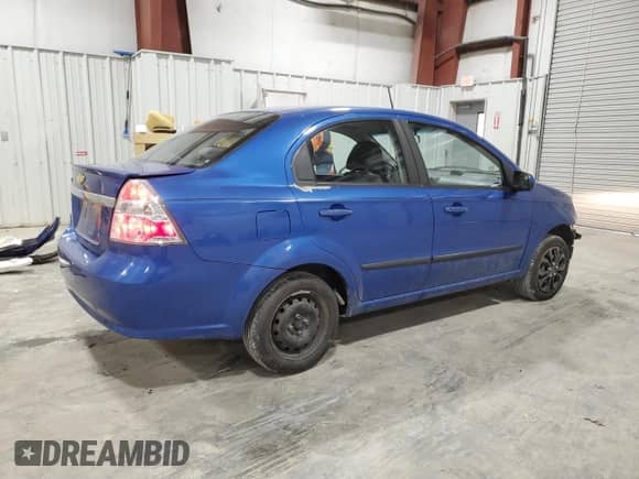 2011 Chevrolet Aveo 1LT z VIN KL1TD5DEXBB140334, wystawiony jako Copart lot #41641515 z przebiegiem 52 399 mil mil oraz Szkoda całkowita • Salvage title. Historia ofert i sprzedaży dostępna na DreamBid. Obrazek 3.