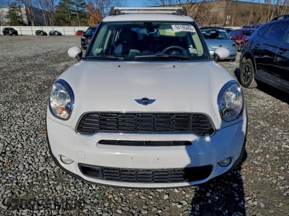 ✅ 2014 MINI Countryman S • VIN: WMWZC5C51EWM17048 • Lot: 94195465. Wystawiony na Copart z przebiegiem 117 357 mil. Bezpłatny archiwum sprzedaży aukcyjnych z USA i szczegółowy raport historii pojazdu na DreamBid. Zdjęcie 5.