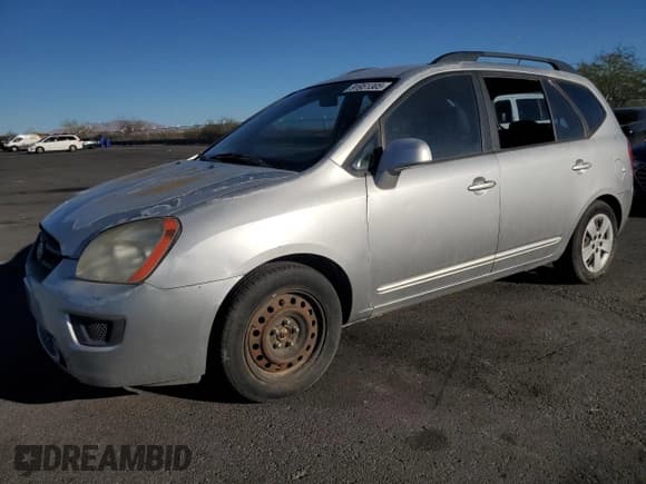 ✅ 2009 Kia Rondo LX • VIN: KNAFG528597247666 • Lot: 91951305. Wystawiony na Copart z przebiegiem 103 966 mil. Bezpłatny archiwum sprzedaży aukcyjnych z USA i szczegółowy raport historii pojazdu na DreamBid. Zdjęcie 1.