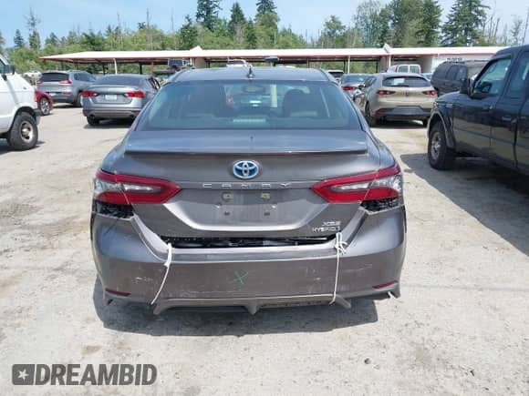 2021 Toyota Camry Hybrid XSE with VIN 4T1K31AK2MU559887, listed as a IAAI auction lot 42487632 with 24,069 mi miles and . Bid and sale history available at DreamBid. Image 16.