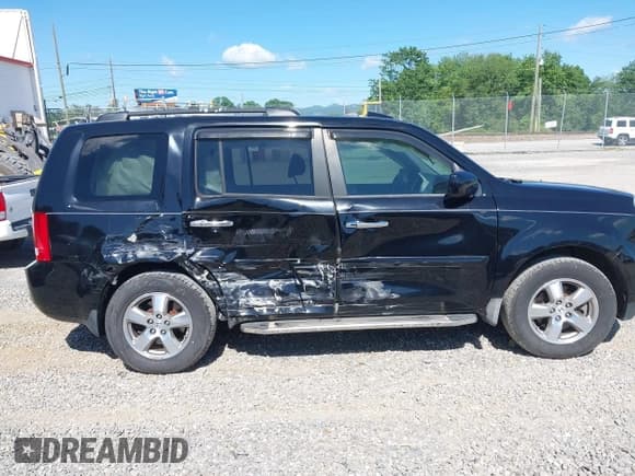 ✅ 2010 Honda Pilot EX-L • VIN: 5FNYF3H57AB003354 • Lot: 42318261. Listed on IAAI with 170,712 mi. Free auction sales archive from the USA and detailed vehicle history report at DreamBid. Image 13.
