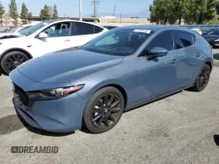 ✅ 2022 Mazda 3 Premium • VIN: JM1BPAML8N1511424 • Lot: 57108135. Listed on Copart with 52,791 mi. Free auction sales archive from the USA and detailed vehicle history report at DreamBid. Image 1.