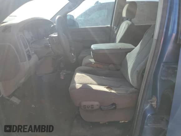 2004 Dodge 1500 SLT z VIN 1D7HU18D24S606095, wystawiony jako Copart lot #75174124 z przebiegiem Nie podano mil oraz Szkoda całkowita • Salvage title. Historia ofert i sprzedaży dostępna na DreamBid. Obrazek 7.