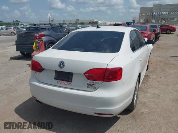 ✅ 2013 Volkswagen Jetta SE • VIN: 3VWDX7AJXDM365203 • Lot: 42551918. Listed on IAAI with 124,946 mi. Free auction sales archive from the USA and detailed vehicle history report at DreamBid. Image 4.