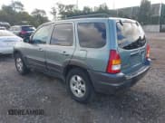 ✅ 2003 Mazda Tribute LX • VIN: 4F2CZ94133KM29605 • Lot: 43264251. Listed on IAAI with Not provided. Free auction sales archive from the USA and detailed vehicle history report at DreamBid. Image 3.