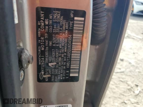 2013 Hyundai Tucson GL z VIN KM8JT3AB5DU654984, wystawiony jako Copart lot #72258644 z przebiegiem 123 394 mil mil oraz Szkoda całkowita • Salvage title. Historia ofert i sprzedaży dostępna na DreamBid. Obrazek 13.