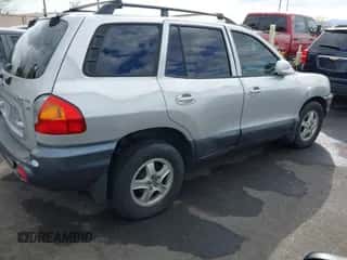 2002 Hyundai Santa Fe GLS z VIN KM8SC13D62U322962, wystawiony jako IAAI lot #41437333 z przebiegiem 183 711 mil mil oraz . Historia ofert i sprzedaży dostępna na DreamBid. Obrazek 4.