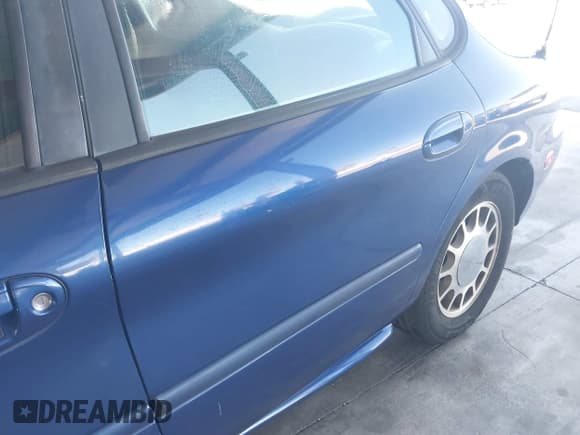 ✅ 1996 Ford Taurus LX • VIN: 1FALP53SXTG122417 • Лот: 43017426. Опубликован ранее на IAAI с пробегом 121 870 миль. Бесплатный доступ к архиву аукционных продаж из США и подробный отчёт об истории автомобиля на DreamBid. Изображение 6.