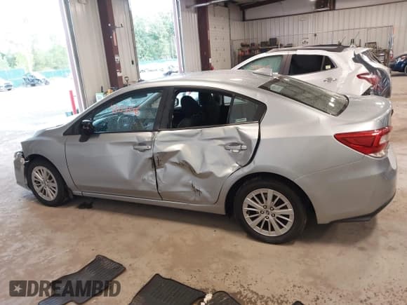 ✅ 2017 Subaru Impreza Premium • VIN: 4S3GKAB64H3602636 • Lot: 43153516. Listed on IAAI with 90,021 mi. Free auction sales archive from the USA and detailed vehicle history report at DreamBid. Image 14.