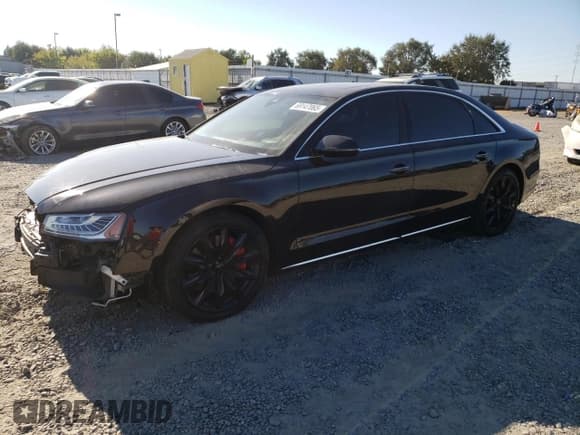 ✅ 2016 Audi A8 3.0T • VIN: WAU34AFD2GN013537 • Lot: 69147065. Listed on Copart with 121,990 mi. Free auction sales archive from the USA and detailed vehicle history report at DreamBid. Image 1.