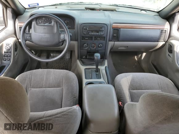 ✅ 1999 Jeep Grand Cherokee Laredo • VIN: 1J4G258S0XC563922 • Лот: 55491645. Опубликован ранее на Copart с пробегом Не указан. Бесплатный доступ к архиву аукционных продаж из США и подробный отчёт об истории автомобиля на DreamBid. Изображение 8.