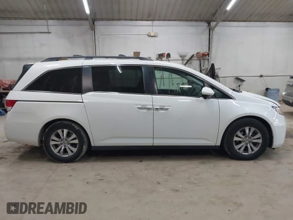 ✅ 2015 Honda Odyssey EX-L • VIN: 5FNRL5H63FB107784 • Лот: 43409033. Опубликован ранее на IAAI с пробегом 126 045 миль. Бесплатный доступ к архиву аукционных продаж из США и подробный отчёт об истории автомобиля на DreamBid. Изображение 13.