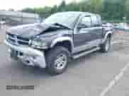 2002 Dodge Dakota SLT с VIN 1B7HG48N02S519241, выставлен на аукционе IAAI как лот 43121163 с пробегом 102 842 миль миль и . История ставок и продаж доступна на DreamBid. Изображение 2.