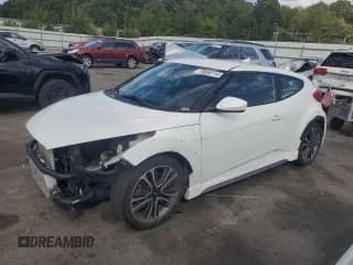 ✅ 2016 Hyundai Veloster Turbo • VIN: KMHTC6AE9GU296054 • Lot: 70650114. Wystawiony na Copart z przebiegiem 105 824 mil. Bezpłatny archiwum sprzedaży aukcyjnych z USA i szczegółowy raport historii pojazdu na DreamBid. Zdjęcie 1.
