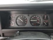 ✅ 1996 Jeep Cherokee Sport • VIN: 1J4FT68S8TL128381 • Lot: 57496175. Listed on Copart with 221,330 mi. Free auction sales archive from the USA and detailed vehicle history report at DreamBid. Image 9.