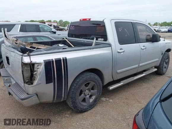 ✅ 2004 Nissan Titan XE • VIN: 1N6AA07A54N593067 • Lot: 41956764. Listed on IAAI with 256,100 mi. Free auction sales archive from the USA and detailed vehicle history report at DreamBid. Image 4.