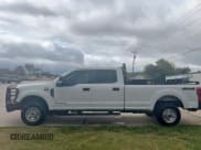 ✅ 2019 Ford F-350 XL • VIN: 1FT8W3BT1KEE59618 • Lot: 90719275. Listed on Copart with 103,999 mi. Free auction sales archive from the USA and detailed vehicle history report at DreamBid. Image 11.