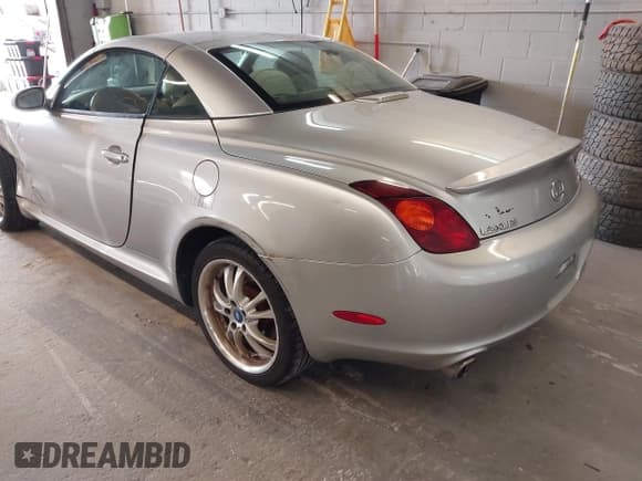 ✅ 2004 Lexus SC 430 • VIN: JTHFN48Y740051061 • Lot: 43307107. Listed on IAAI with 148,224 mi. Free auction sales archive from the USA and detailed vehicle history report at DreamBid. Image 3.
