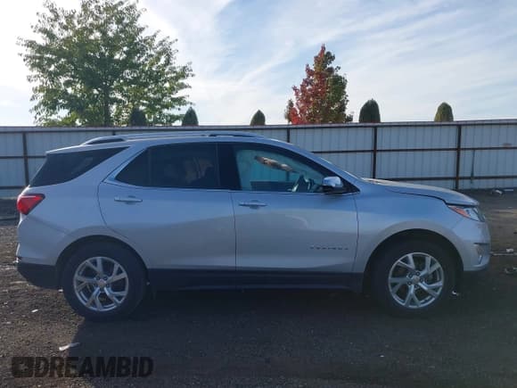 ✅ 2018 Chevrolet Equinox Premier • VIN: 2GNAXVEV1J6196158 • Лот: 43483047. Опубликован ранее на IAAI с пробегом 86 007 миль. Бесплатный доступ к архиву аукционных продаж из США и подробный отчёт об истории автомобиля на DreamBid. Изображение 13.